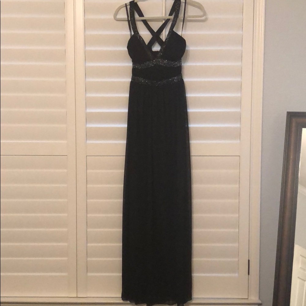 Floor length black gown with beaded detailing